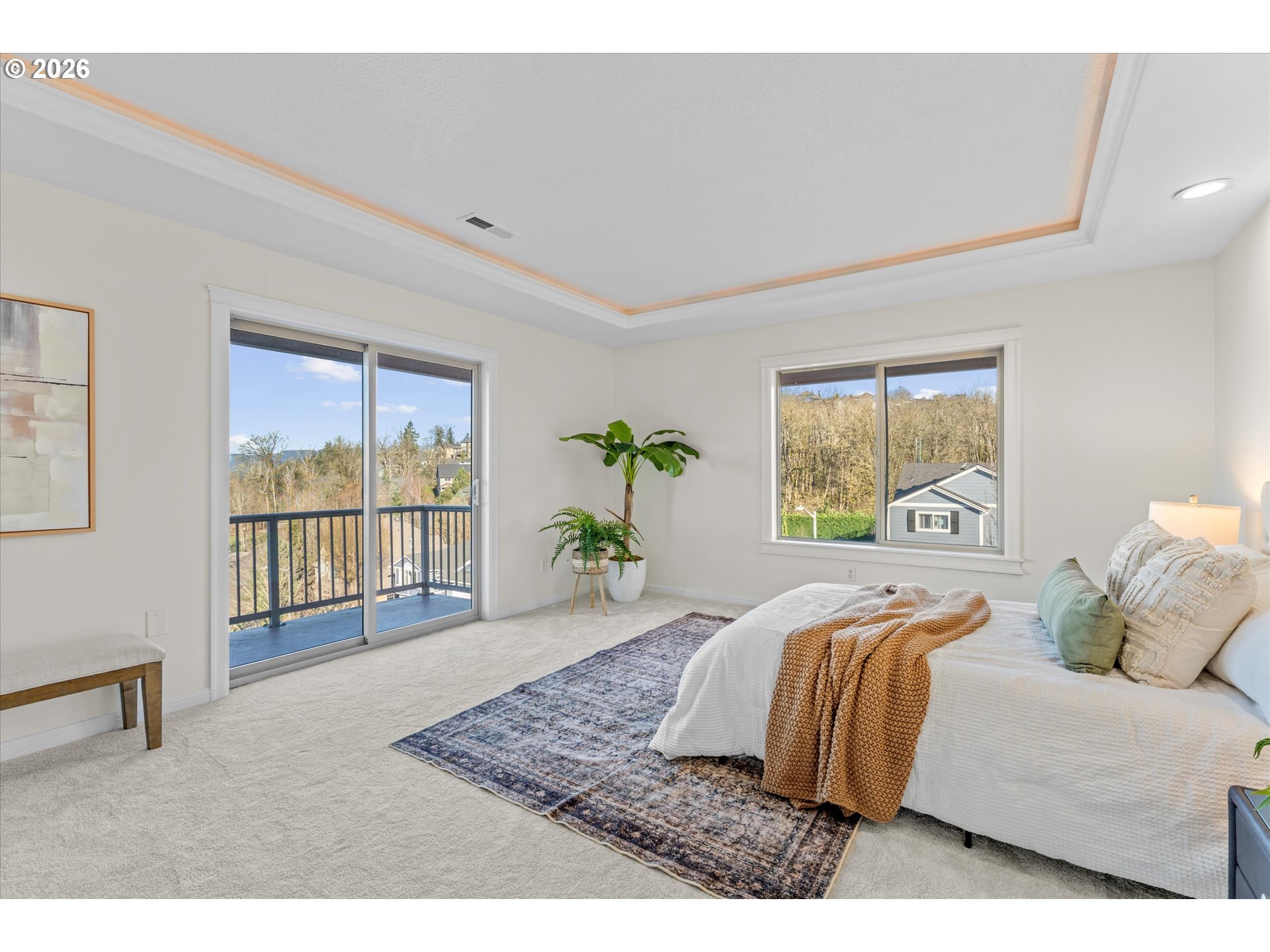 1727 Northwest Ogden Street Camas, WA 98607 - Photo 21 of 48 a bedroom with a large bed and a large window