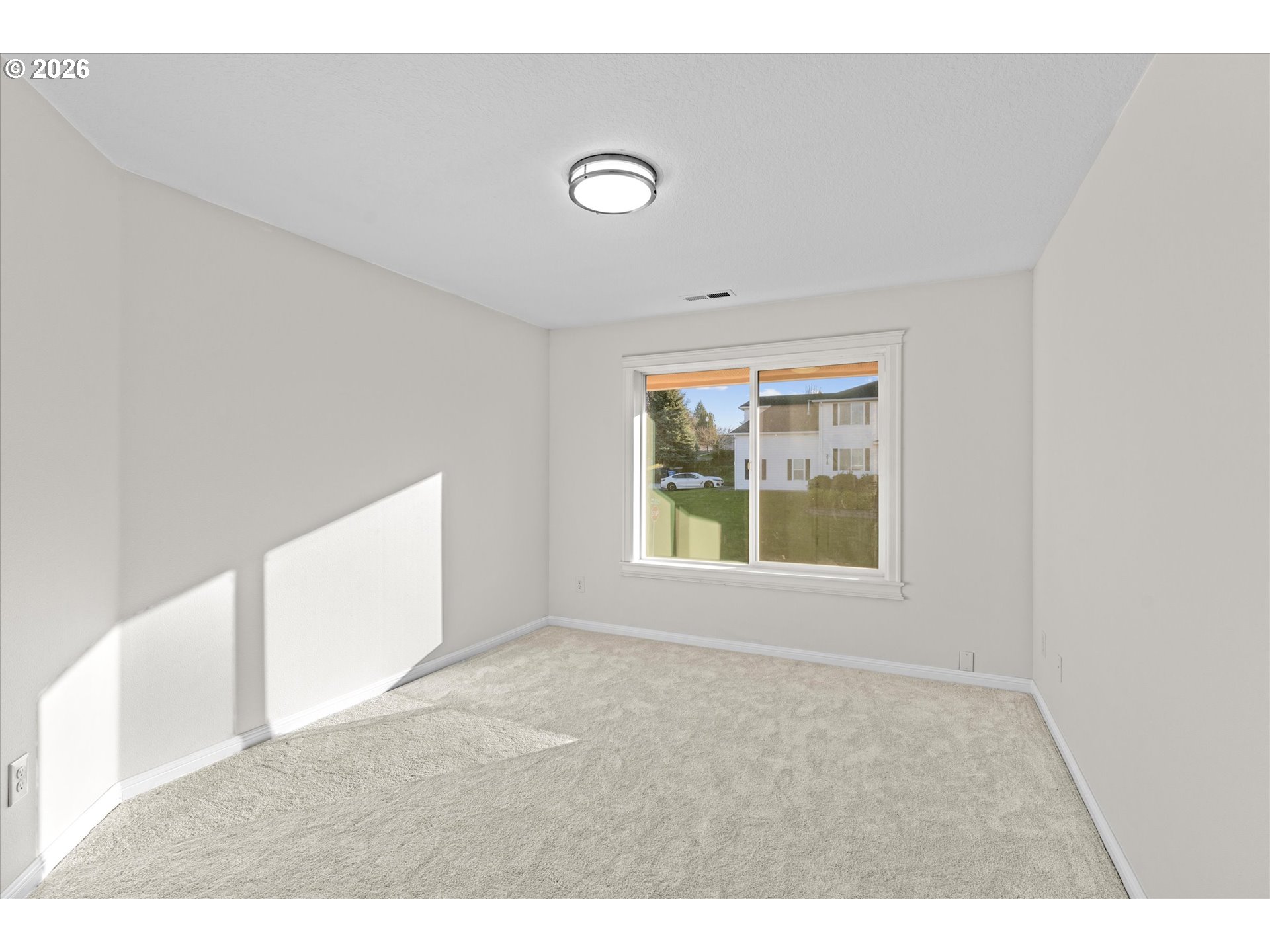 1727 Northwest Ogden Street Camas, WA 98607 - Photo 25 of 48 a view of an empty room with a window