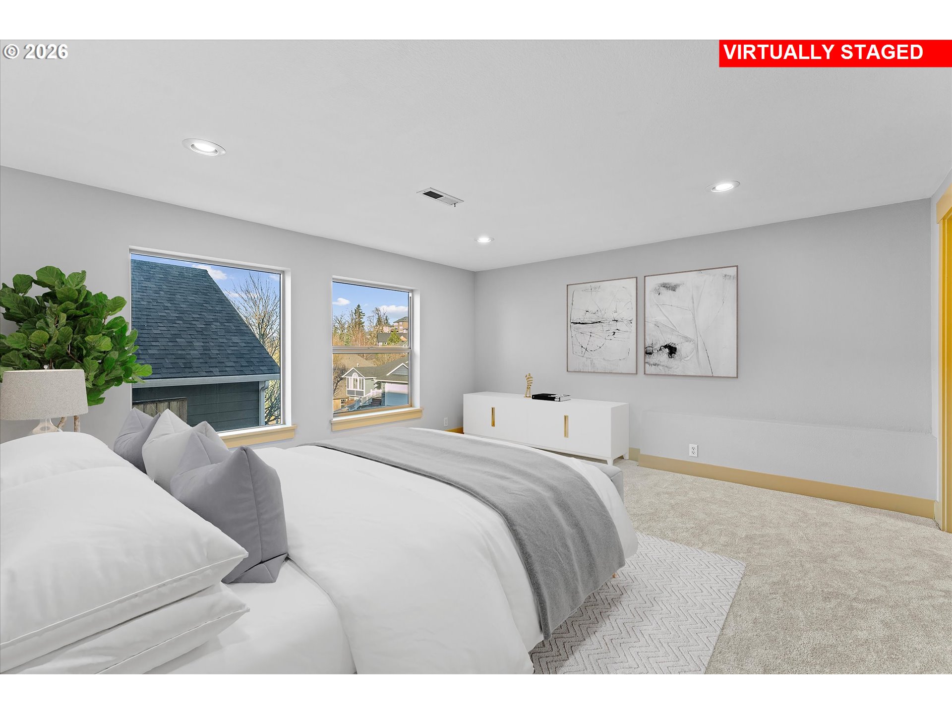 1727 Northwest Ogden Street Camas, WA 98607 - Photo 42 of 48 a bedroom with a large bed and a large window