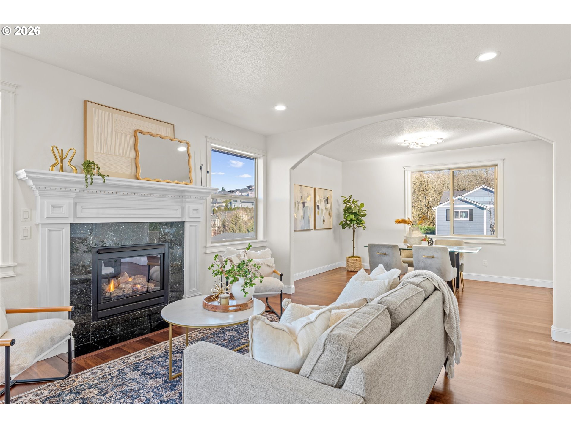 1727 Northwest Ogden Street Camas, WA 98607 - Photo 8 of 48 a living room with furniture and a fireplace