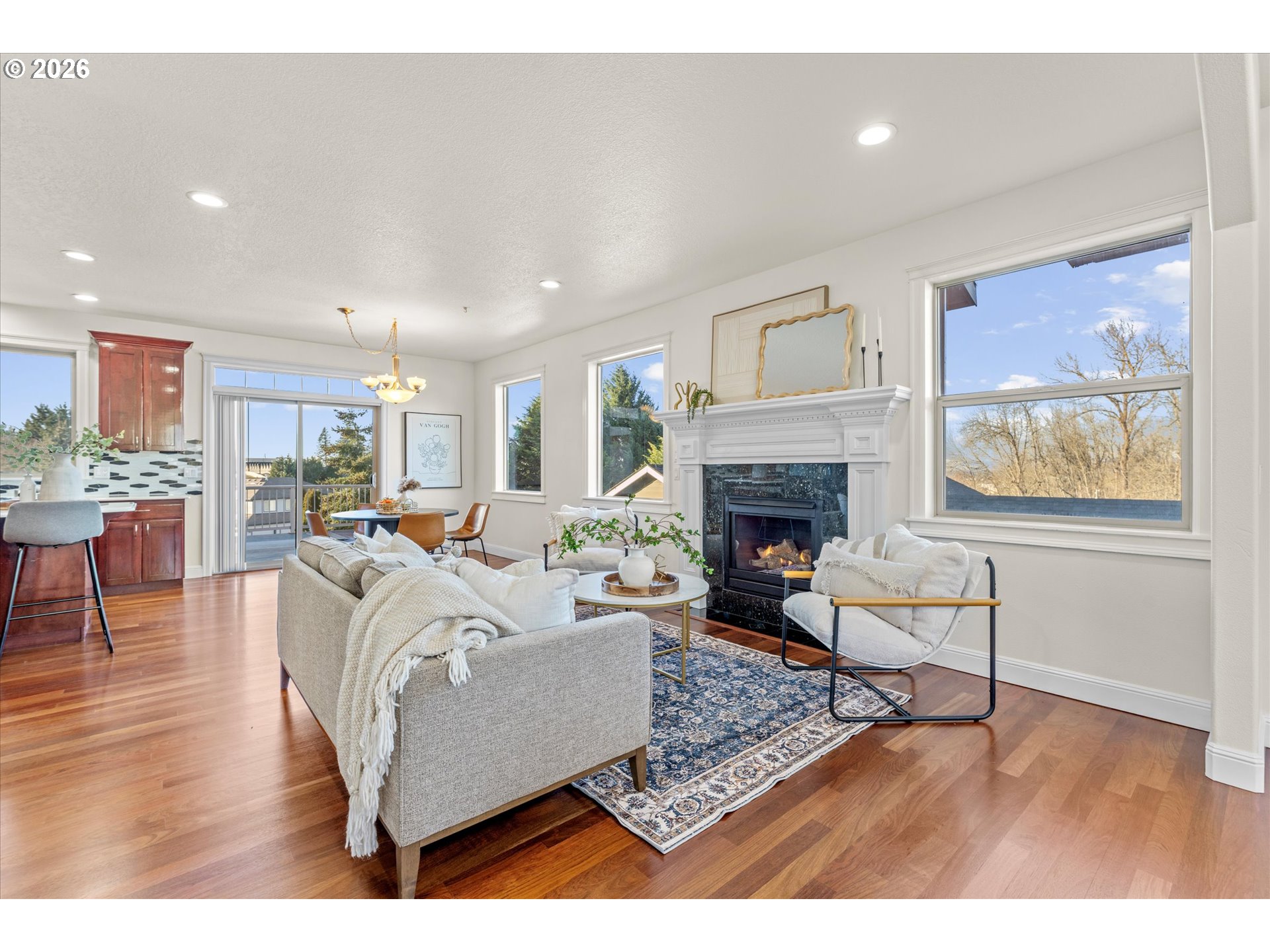 1727 Northwest Ogden Street Camas, WA 98607 - Photo 9 of 48 a living room with furniture and a fireplace