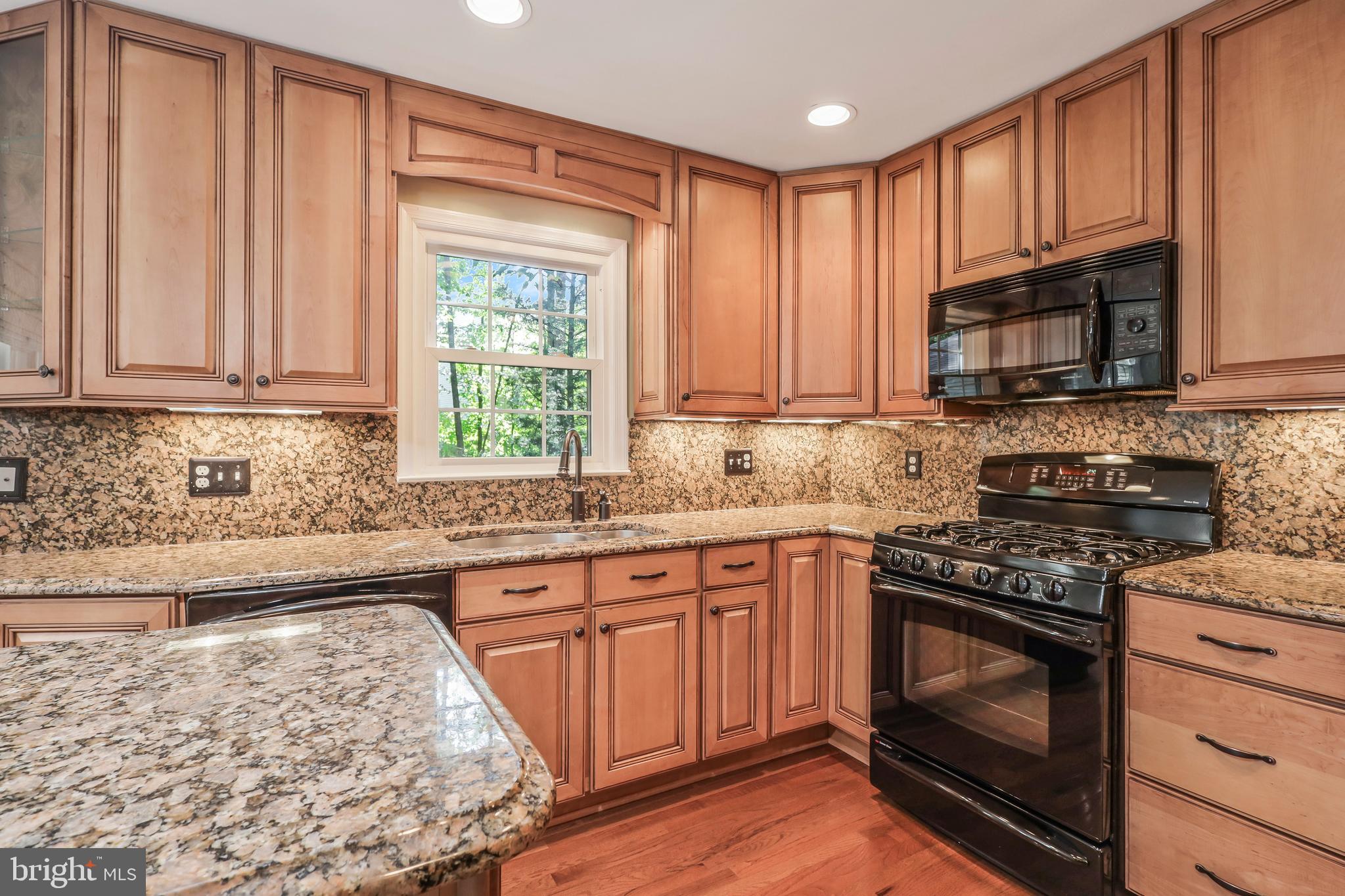 8711 Shadowlake Way Springfield, VA 22153 - Photo 11 of 49 Wall of windows with views into private backyard