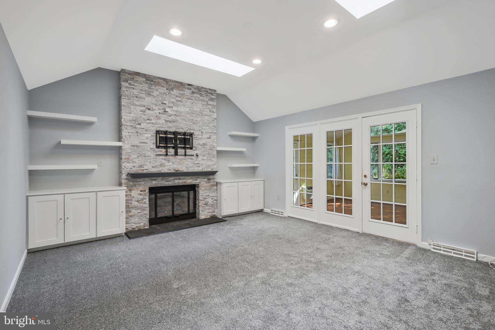 8711 Shadowlake Way Springfield, VA 22153 - Photo 16 of 49 Gas FP, Skylights, built ins, & Floating shelves