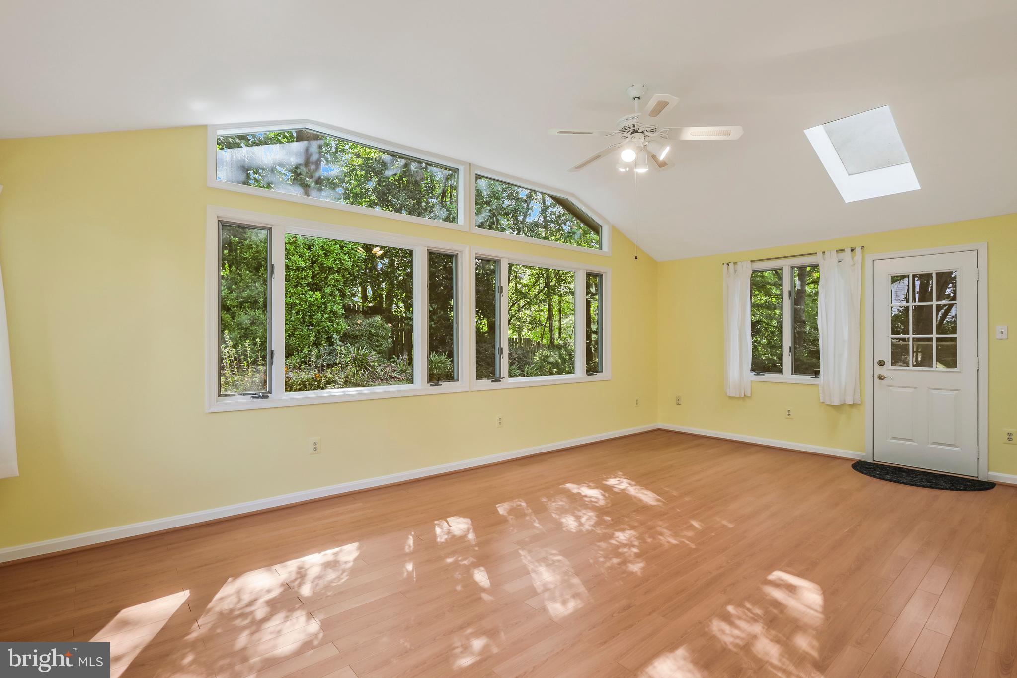 8711 Shadowlake Way Springfield, VA 22153 - Photo 19 of 49 Sunroom with 2 exterior doors and wall of windows