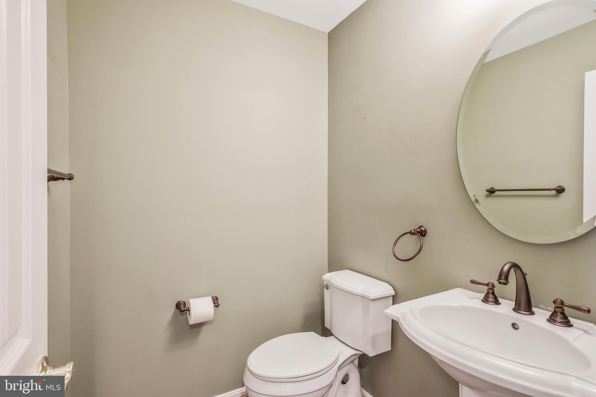 8711 Shadowlake Way Springfield, VA 22153 - Photo 21 of 49 Main floor half bath