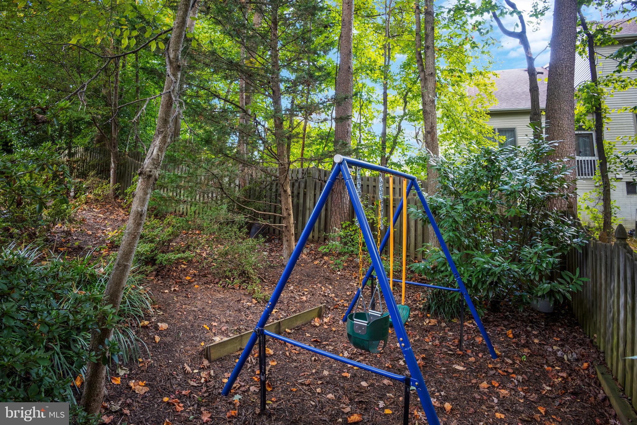 8711 Shadowlake Way Springfield, VA 22153 - Photo 49 of 49 Small swing set conveys