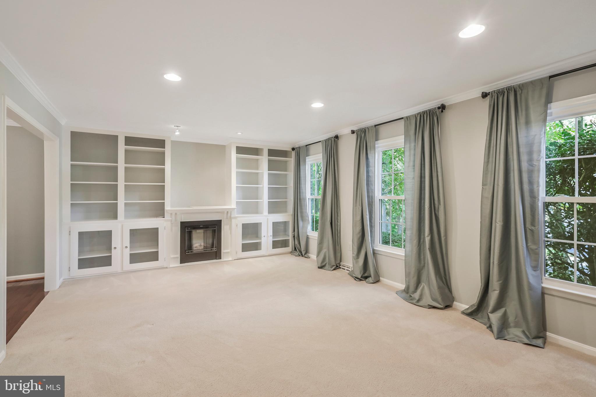 8711 Shadowlake Way Springfield, VA 22153 - Photo 6 of 49 Wall of windows & recessed lighting