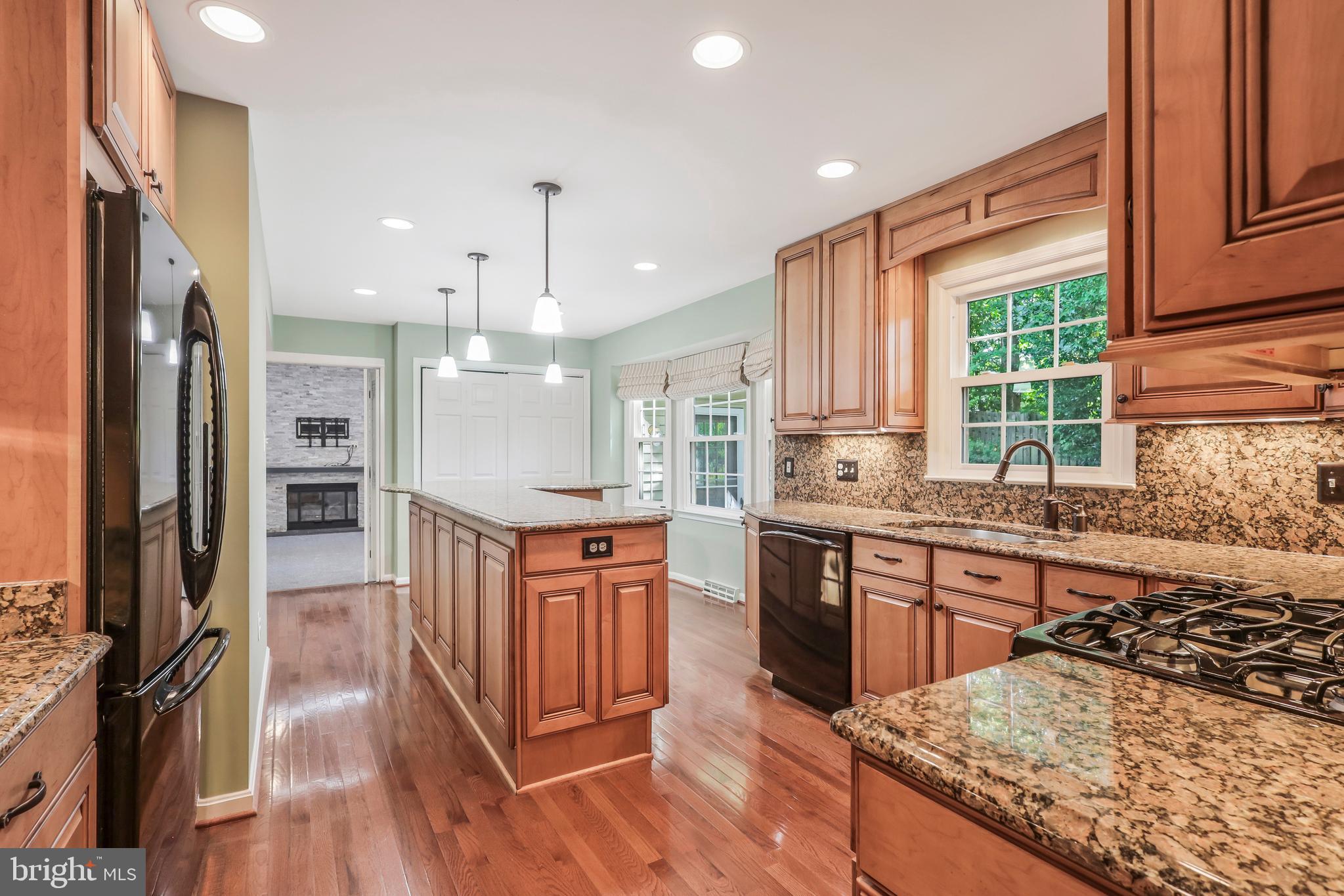 8711 Shadowlake Way Springfield, VA 22153 - Photo 10 of 49 Remodeled kitchen with upgraded cabinets