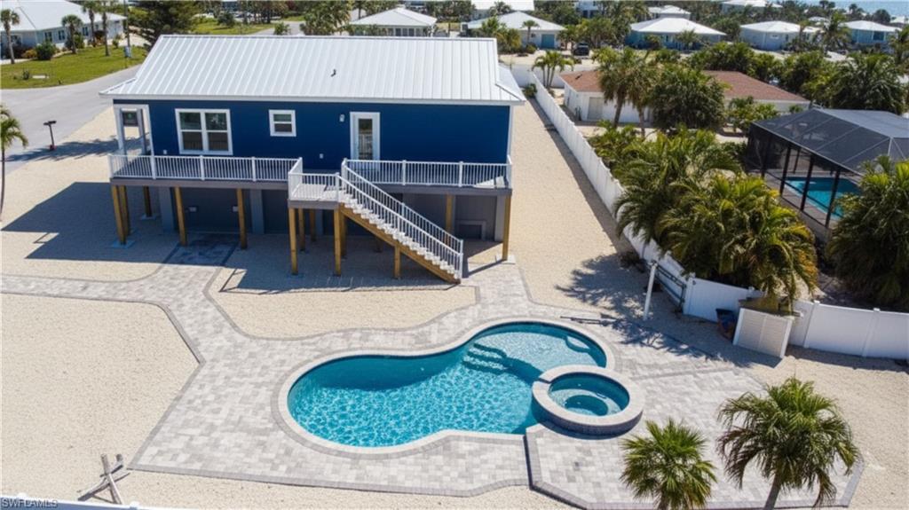 1 Fairview Boulevard Fort Myers Beach, FL 33931 - Photo 41 of 48 an aerial view of a house with garden space and sitting area