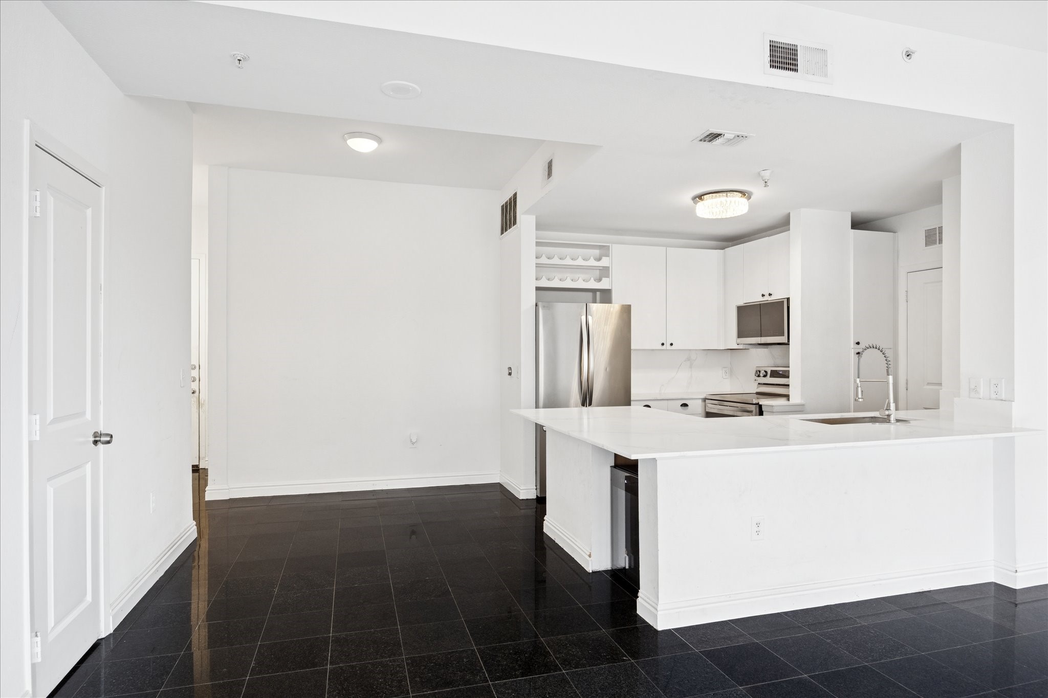 3505 Sage Road, Unit 1106 Houston, TX 77056 - Photo 6 of 22 Clean lines and upscale finishes throughout deliver a chic, urban retreat high above the city.