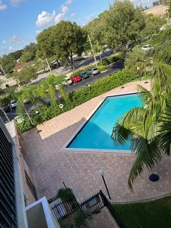a view of a yard with an outdoor space
