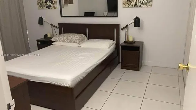 a view of a elevator and front door