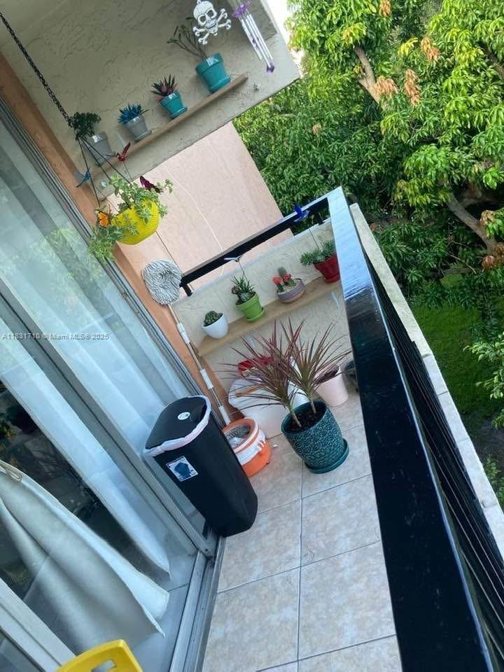 2160 Southwest 16th Avenue, Unit 421 Miami, FL 33145 - Photo 18 of 19 a view of roof deck with furniture