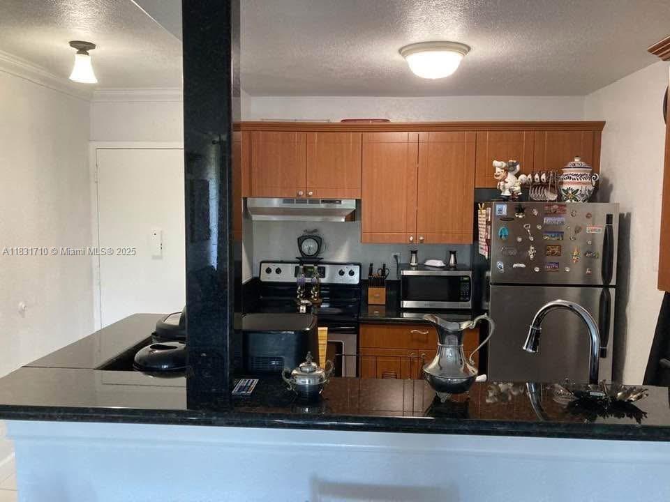 2160 Southwest 16th Avenue, Unit 421 Miami, FL 33145 - Photo 6 of 19 a room with wooden floor