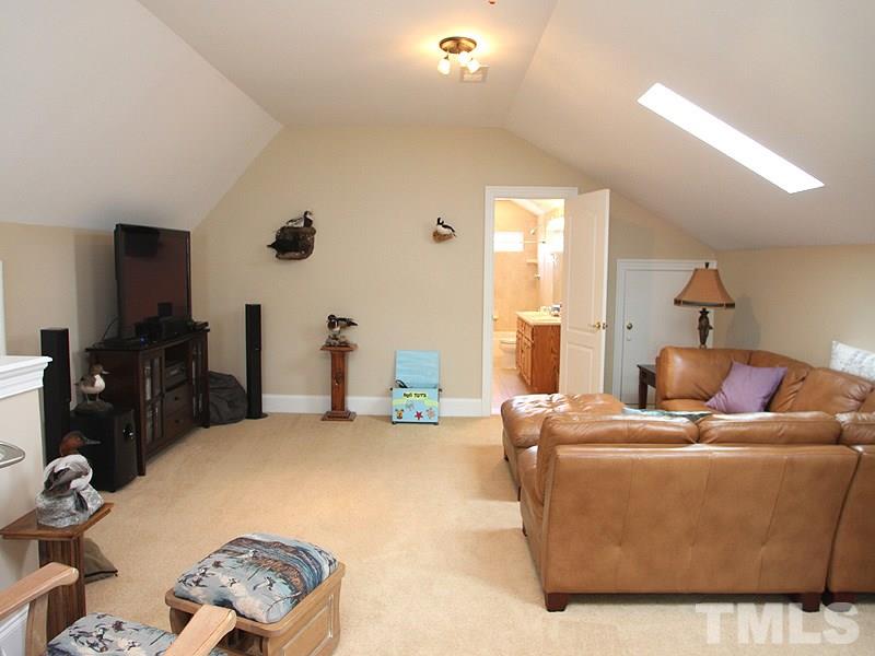 3710 Congeniality Way Raleigh, NC 27613 - Photo 18 of 23 3rd floor finished bonus with skylights and full bath.
