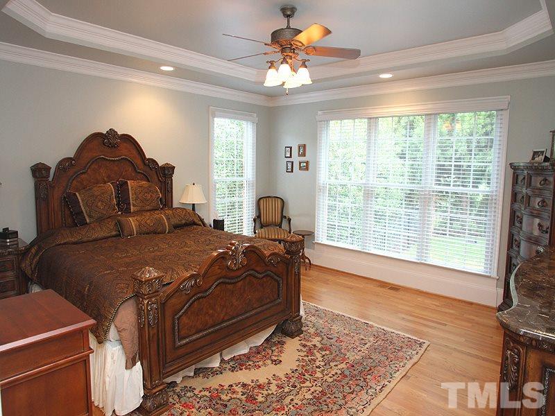 3710 Congeniality Way Raleigh, NC 27613 - Photo 10 of 23 Spacious 1st floor master with trey ceiling, hardwood floors, and ceiling fan.