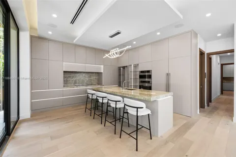 a spacious bedroom with a bed and a couch