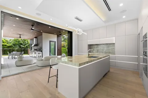 a bathroom with a tub a sink and a shower