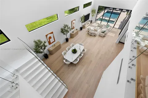 a bathroom with a granite countertop sink a toilet and shower