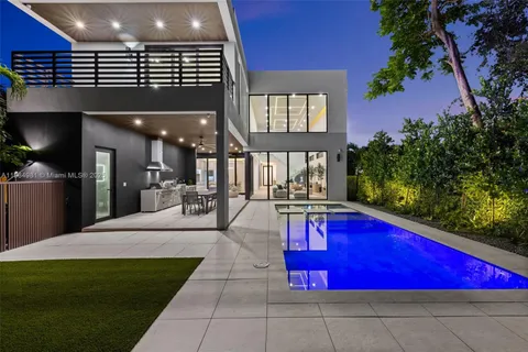 a house view with a garden space