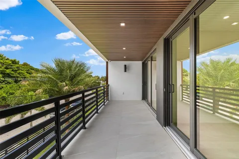 a utility room with sink dryer and washer