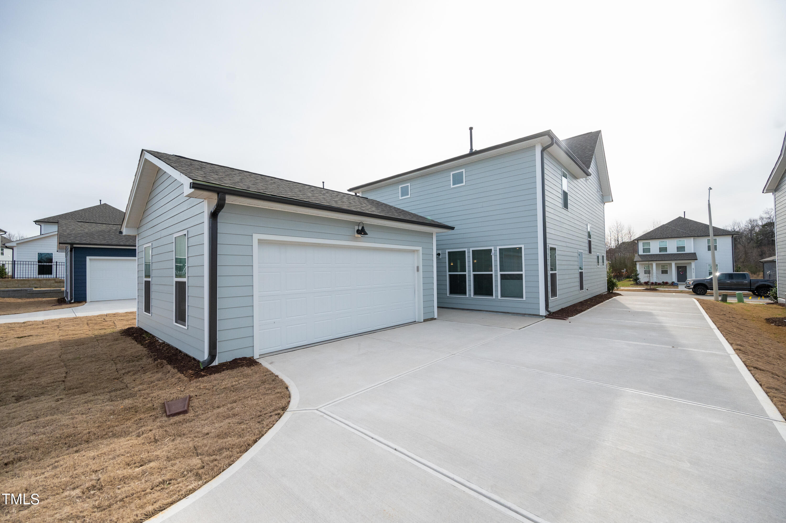 5716 Agrinio Way Raleigh, NC 27603 - Photo 23 of 25 Extra-Long Drive Way