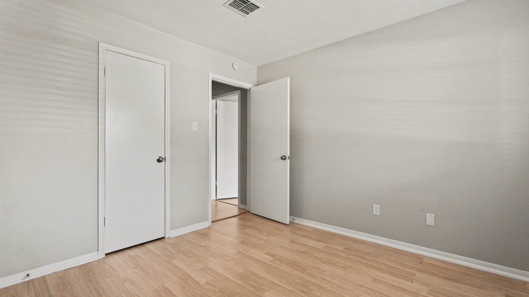 23210 Earlmist Drive Spring, TX 77373 - Photo 19 of 22 a view of an empty room with wooden floor