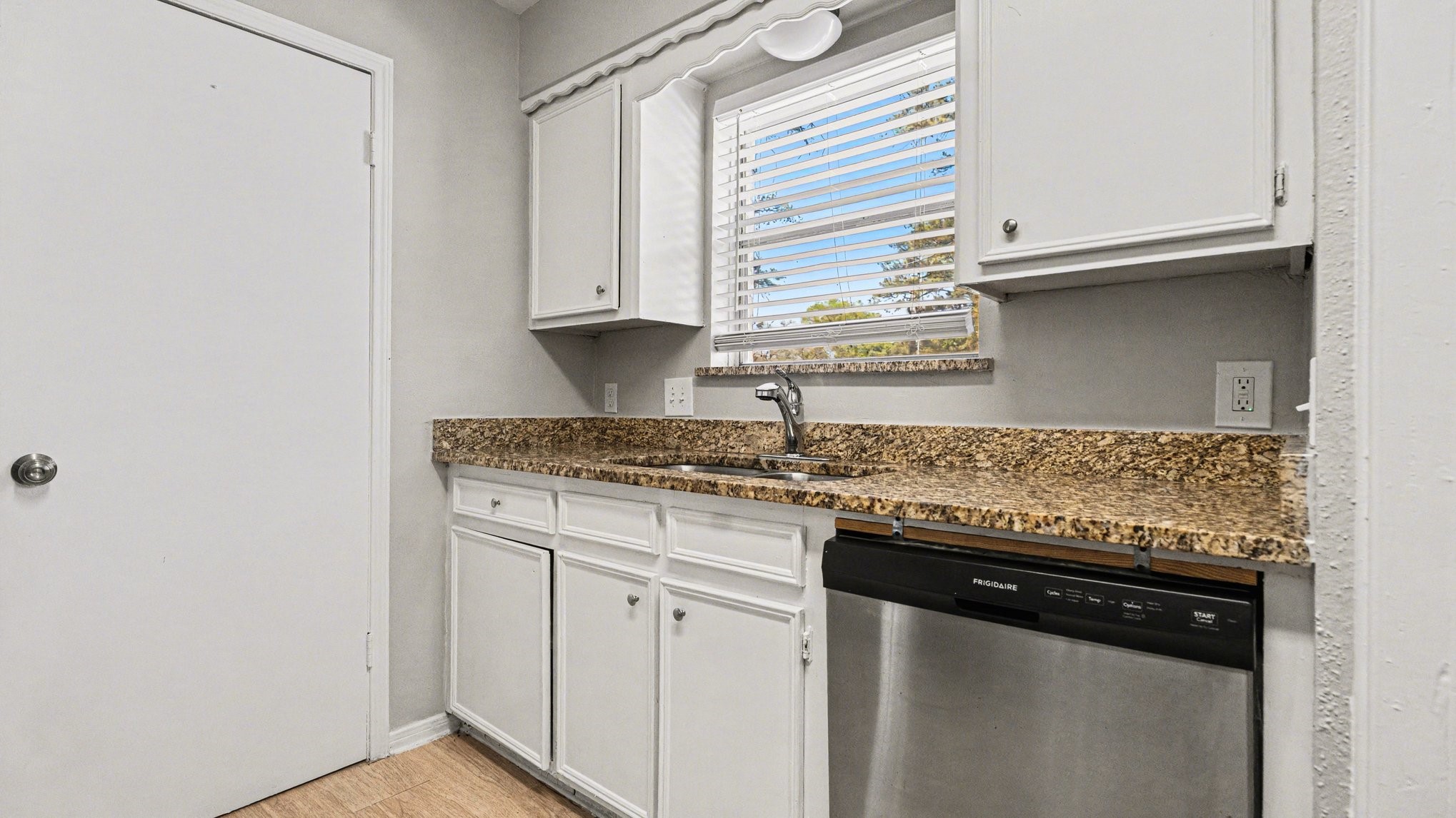 23210 Earlmist Drive Spring, TX 77373 - Photo 8 of 22 a kitchen with granite countertop cabinets stainless steel appliances and a sink
