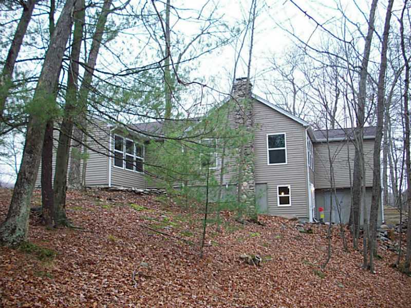 217 Log Road Smithfield, RI 02917 - Photo 3 of 18 Exterior Back.