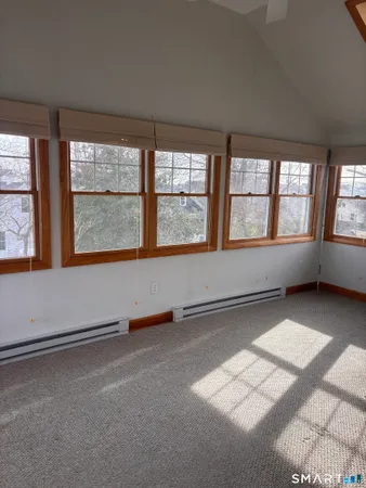 a view of entryway with wooden door
