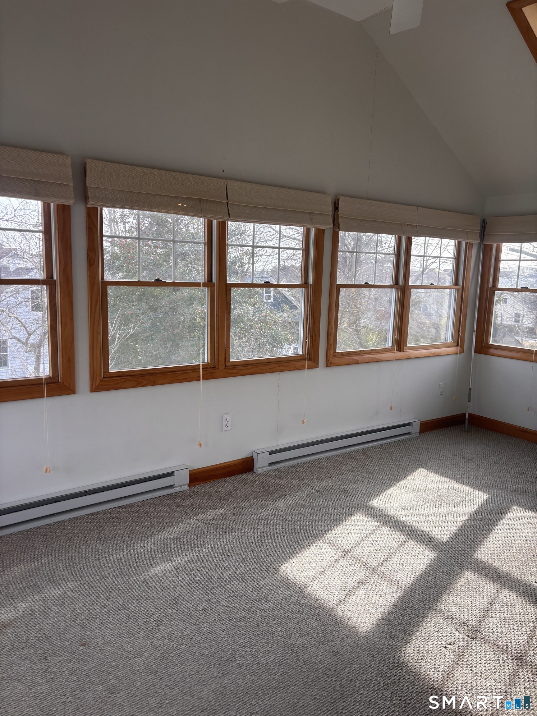 28 Bayberry Lane Groton, CT 06340 - Photo 11 of 17 an empty room with windows