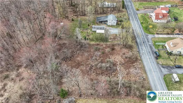 a view of swimming pool from a balcony