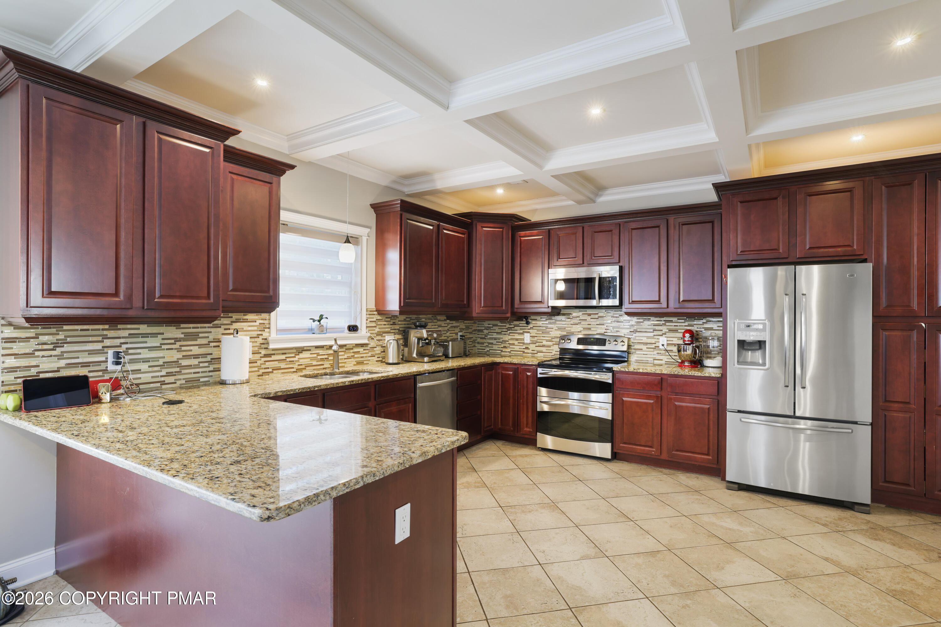 117 Fernwood Road Bushkill, PA 18324 - Photo 14 of 65 a kitchen with stainless steel appliances granite countertop a refrigerator stove a sink and dishwasher