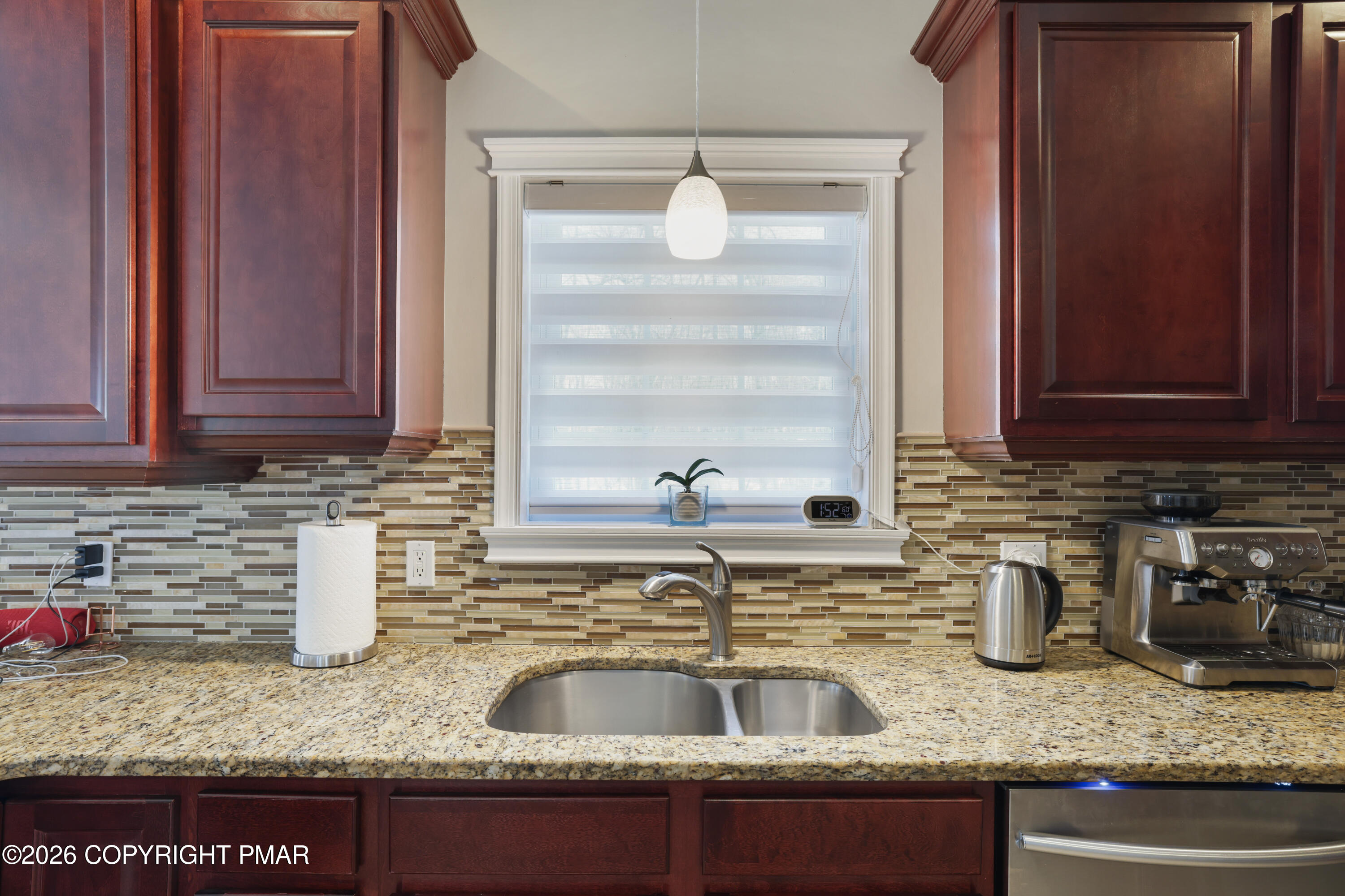 117 Fernwood Road Bushkill, PA 18324 - Photo 16 of 65 a kitchen with granite countertop a sink and a stove