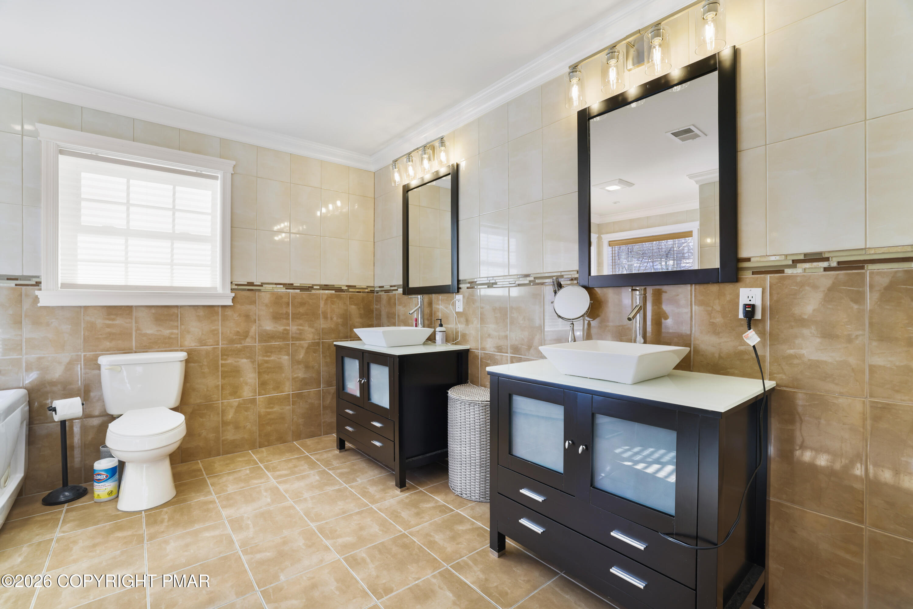 117 Fernwood Road Bushkill, PA 18324 - Photo 35 of 65 a bathroom with a sink toilet and mirror
