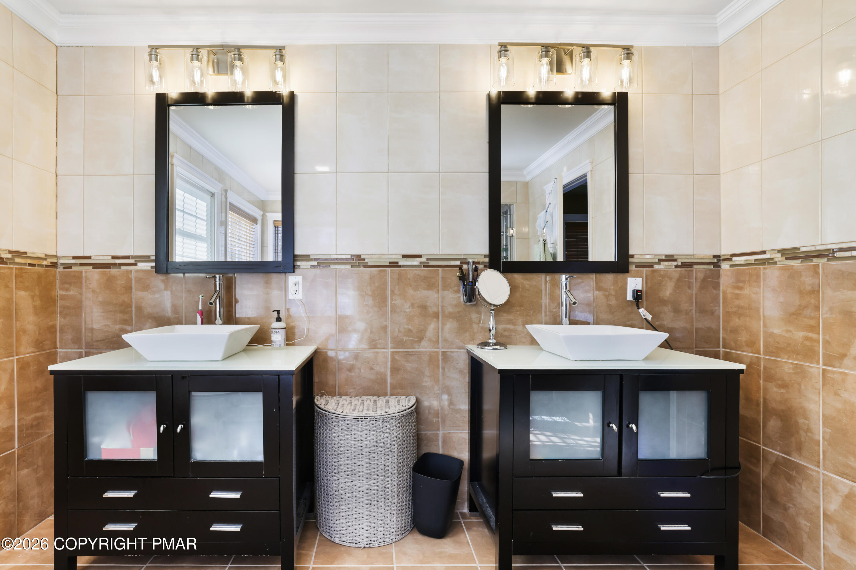 117 Fernwood Road Bushkill, PA 18324 - Photo 36 of 65 a bathroom with a sink and a mirror