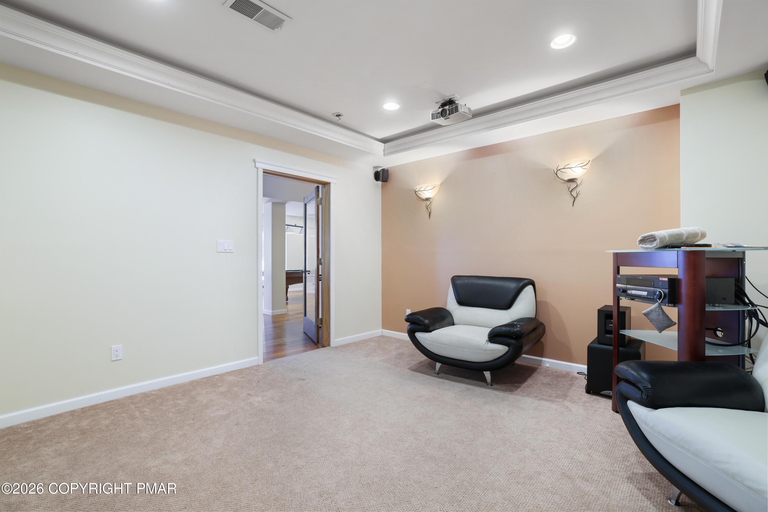 117 Fernwood Road Bushkill, PA 18324 - Photo 54 of 65 a view of a livingroom with furniture and a chair