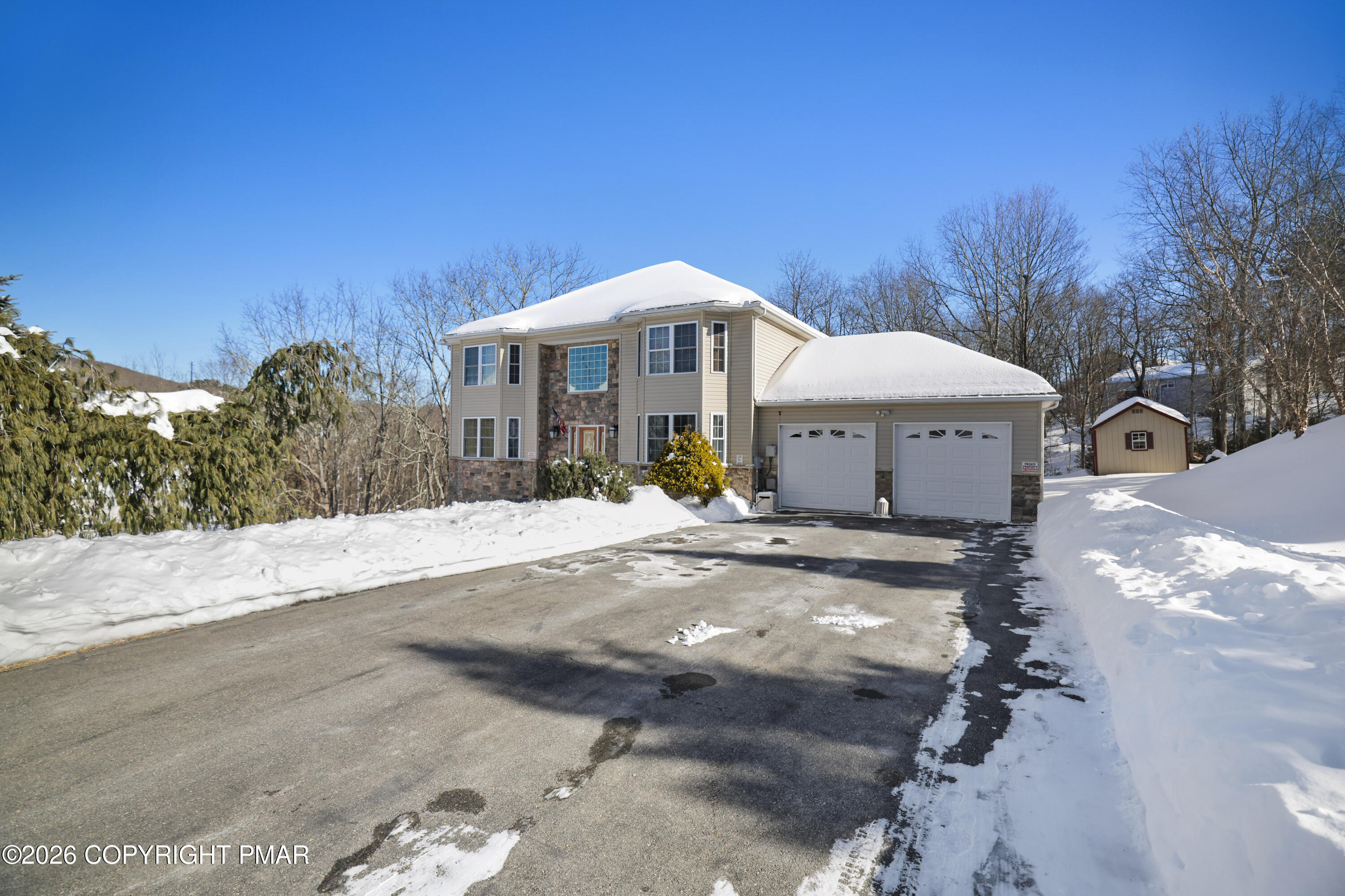 117 Fernwood Road Bushkill, PA 18324 - Photo 63 of 65 a front view of a house with a yard