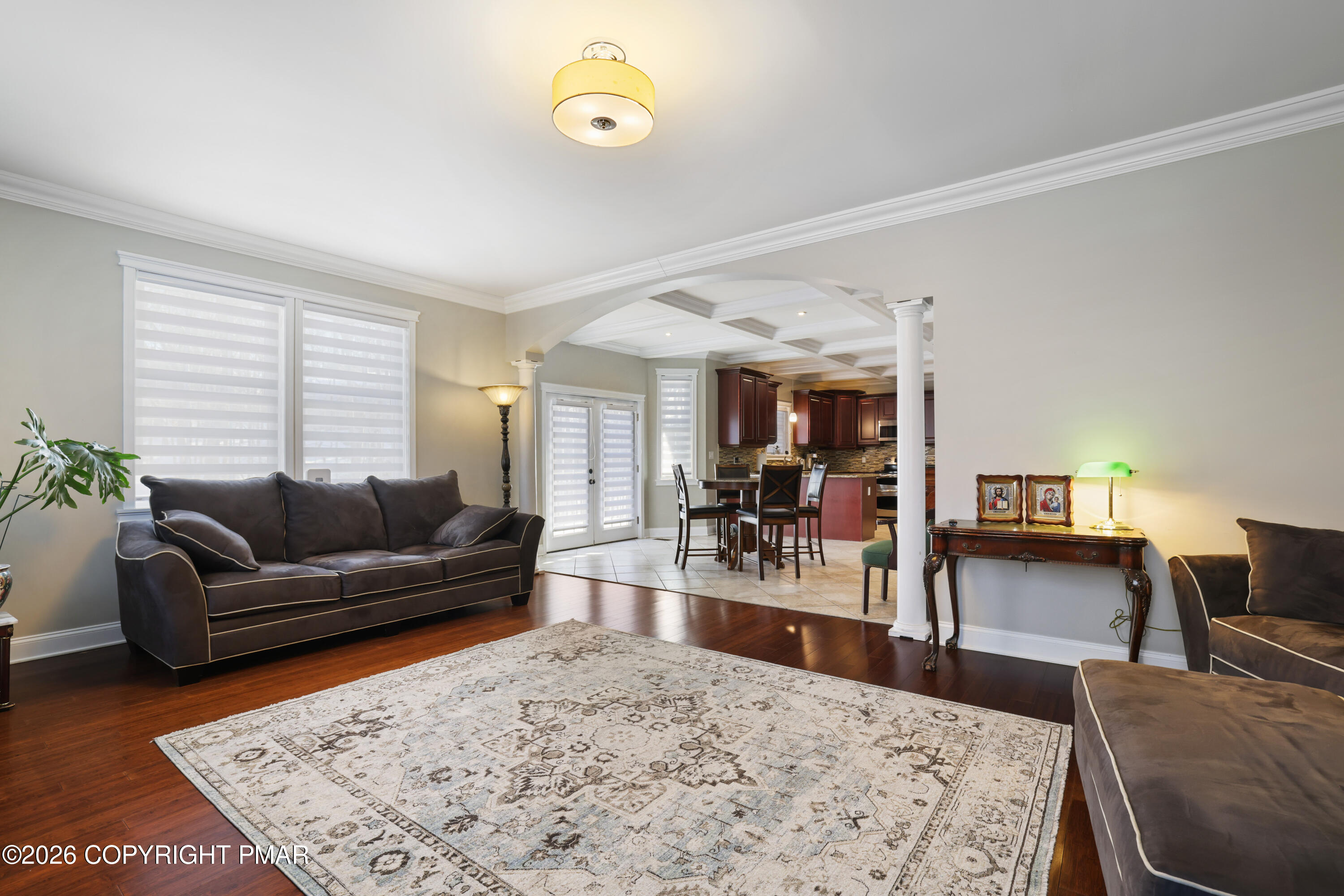 117 Fernwood Road Bushkill, PA 18324 - Photo 9 of 65 a living room with furniture a wooden floor and a flat screen tv
