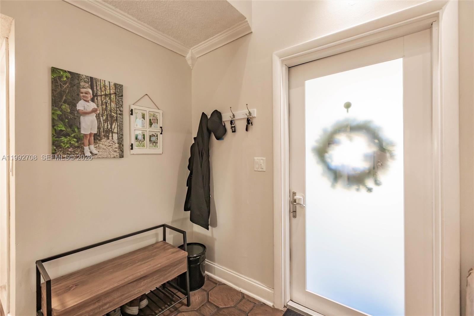 9404 Southwest 8th Terrace, Unit 9404 Miami, FL 33174 - Photo 12 of 41 a view of a hallway with front door