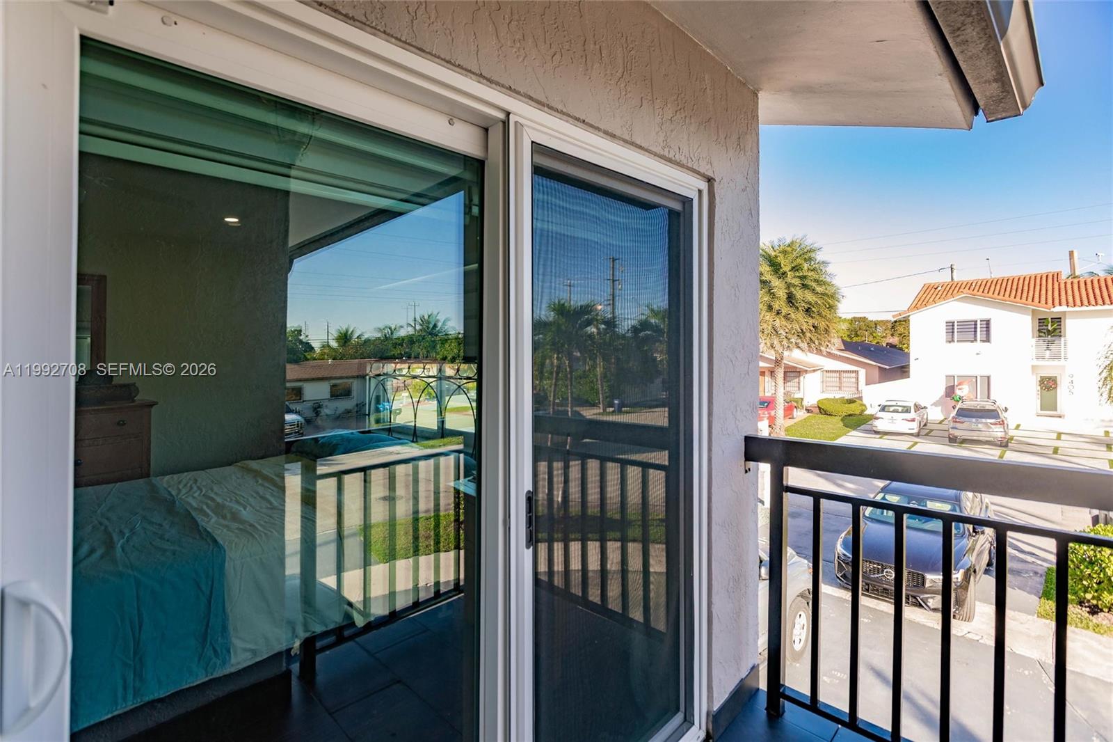9404 Southwest 8th Terrace, Unit 9404 Miami, FL 33174 - Photo 32 of 41 a view of a balcony with a porch