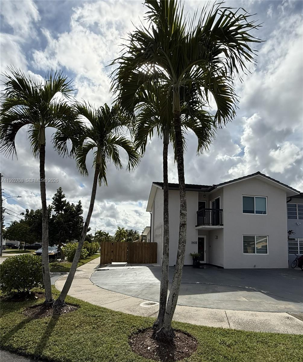 9404 Southwest 8th Terrace, Unit 9404 Miami, FL 33174 - Photo 4 of 41 a view of a backyard with patio