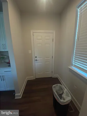 a bathroom with a sink and shower