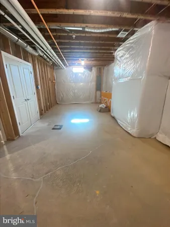 a view of empty room with windows