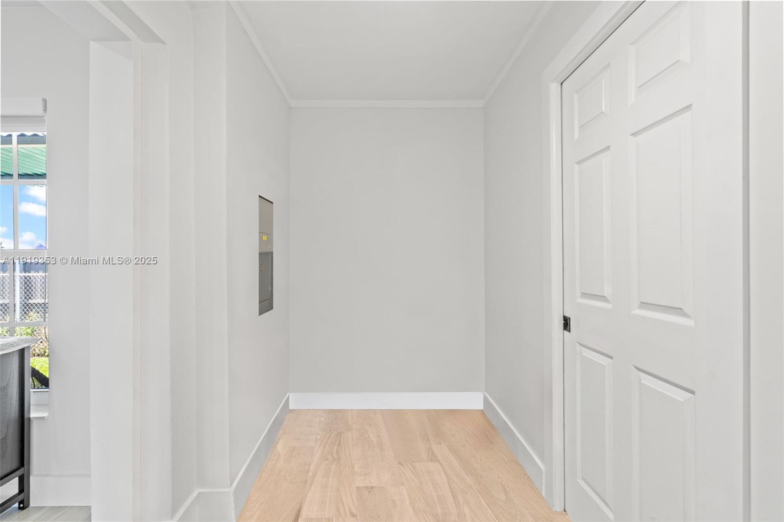 9920 Southwest 35th Terrace Miami, FL 33165 - Photo 11 of 32 a view of a room with wooden floor