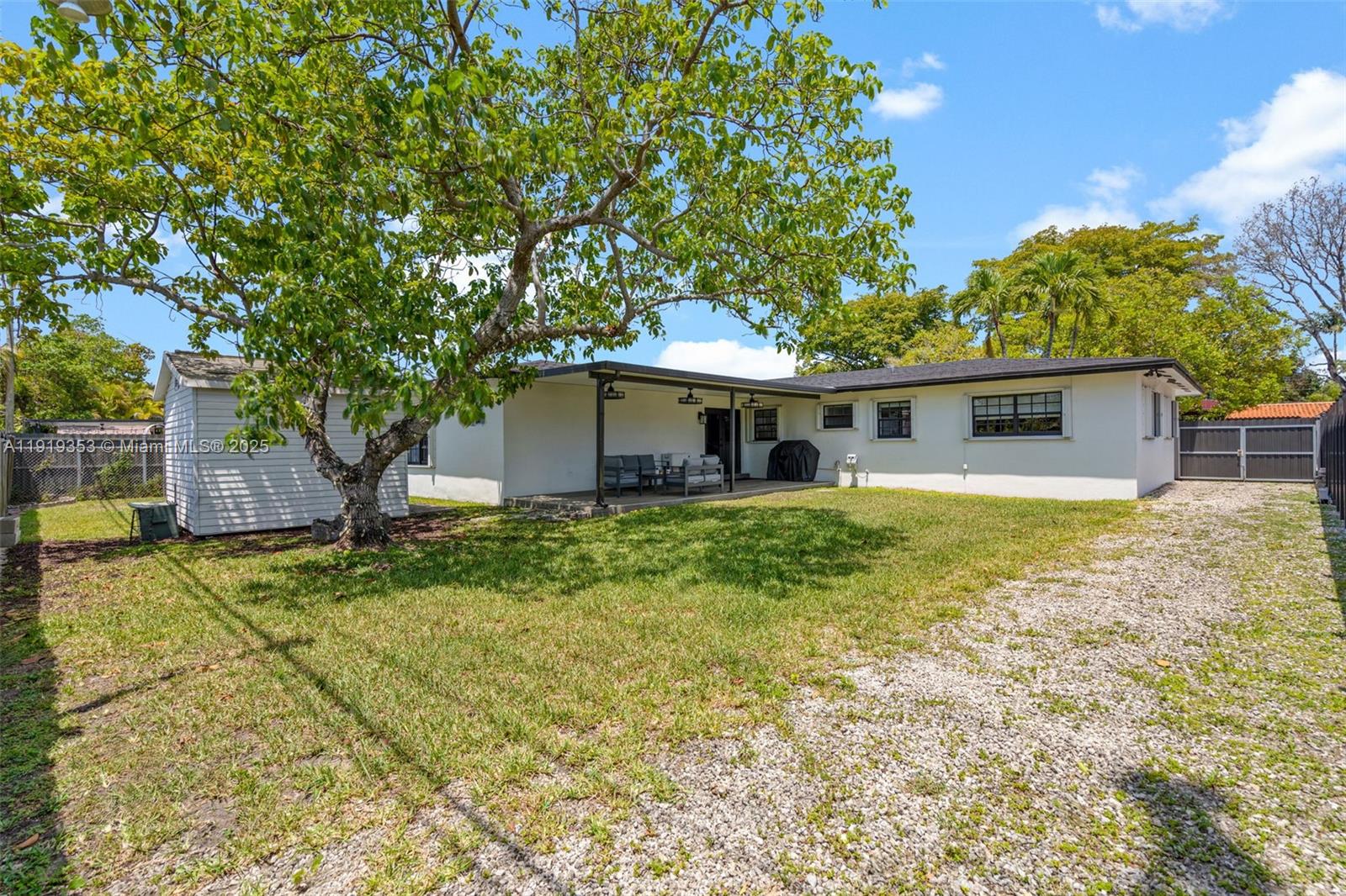 9920 Southwest 35th Terrace Miami, FL 33165 - Photo 30 of 32 a front view of house with yard and trees