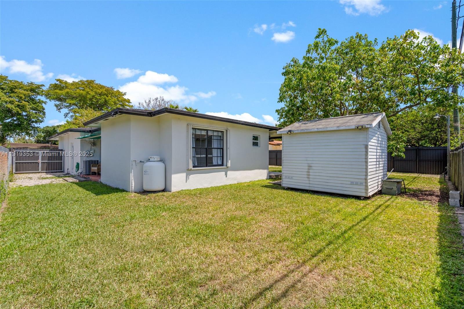 9920 Southwest 35th Terrace Miami, FL 33165 - Photo 31 of 32 a house view with a garden space