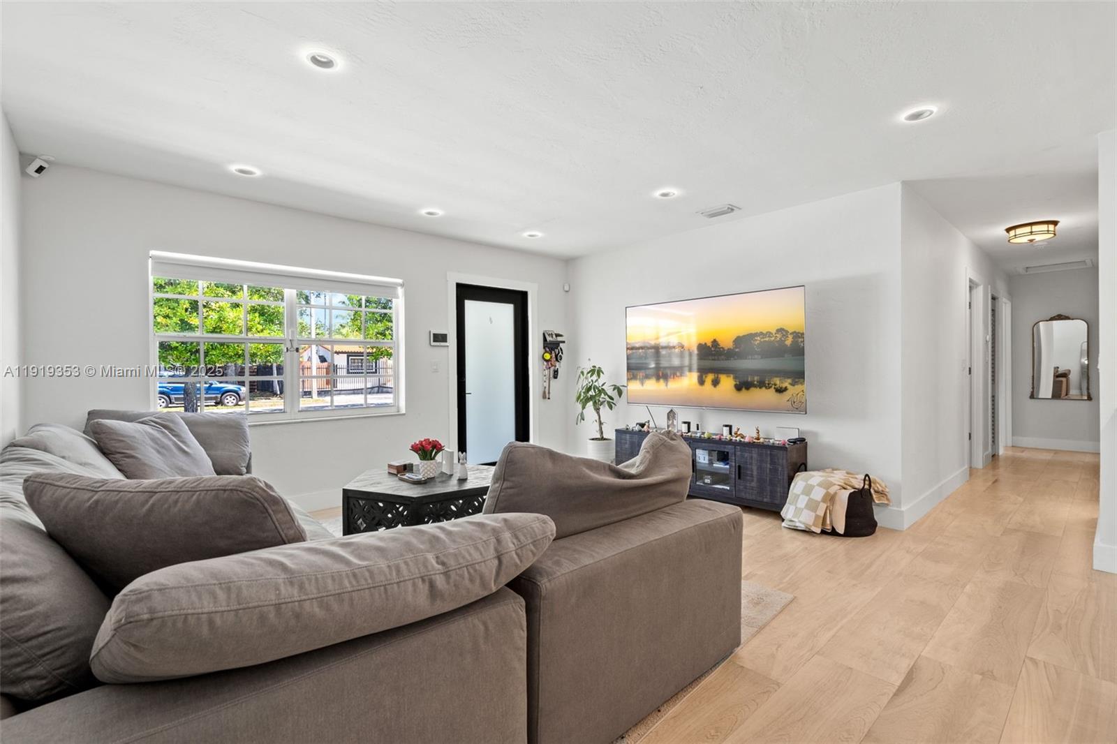 9920 Southwest 35th Terrace Miami, FL 33165 - Photo 6 of 32 a living room with furniture and a large window