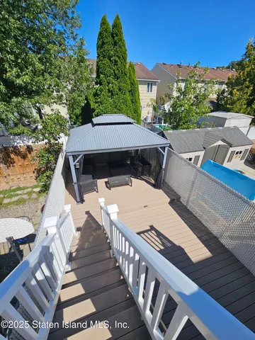 a view of a patio with furniture