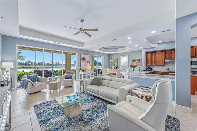 a living room with furniture or outdoor view and a large window